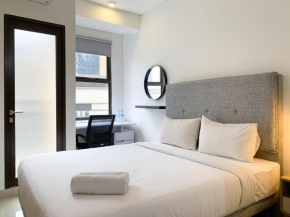 Elegant Studio at Transpark Cibubur Apartment near Shopping Mall By Travelio
